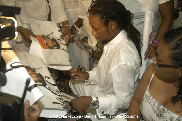 Jah Cure Signs Guest Poster - Reflections - Cure Fest 2007 - All White Birth-Night Party - Hosted by Jah Cure - Starfish Trelawny Hotel - Trelawny, Jamaica - Friday, October 12, 2007 - Cure Fest 2007 October 12th-14th, 2007 Presented by Danger Promotions, Iyah Cure Promotions, and Brass Gate Promotions - Alison Young, Publicist - Photographs by Net2Market.com - Barry J. Hough Sr, Photographer - Negril Travel Guide, Negril Jamaica WI - http://www.negriltravelguide.com - info@negriltravelguide.com...!